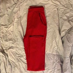 Red pinstripe trousers!